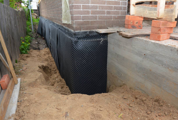 Happy homeowners after waterproofing job in Camas